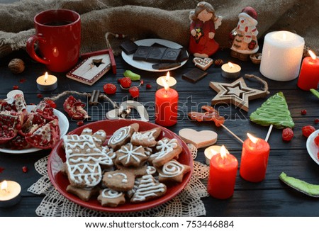 Christmas decorations, gingerbread, tea, candles, fruit and candied fruit, caramel candies and wooden toys