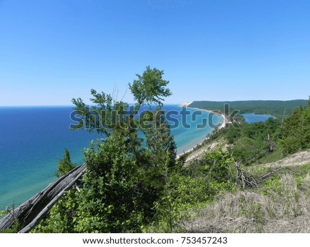 Sleeping Bear Dunes National Lakeshore photographed in the summer with trees, sand dunes, and Lake Michigan