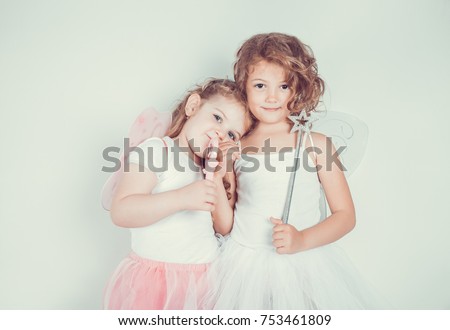 beautiful little butterfly girls  Royalty-Free Stock Photo #753461809