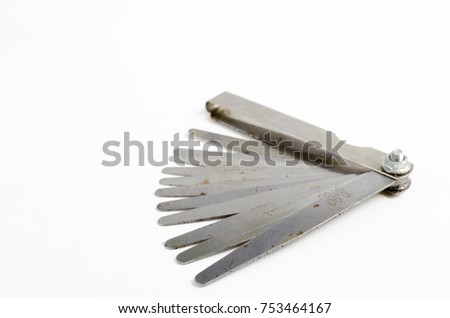 A Studio Photograph of a Set of Feeler Gauges Royalty-Free Stock Photo #753464167