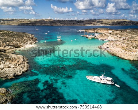 Aerial drone photo - The famous Blue Lagoon in the Mediterranean Sea.  Comino Island, Malta.      Royalty-Free Stock Photo #753514468