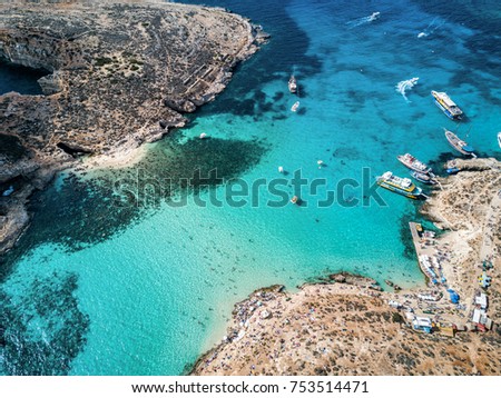 Aerial drone photo - The famous Blue Lagoon in the Mediterranean Sea.  Comino Island, Malta.      Royalty-Free Stock Photo #753514471