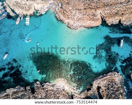 Aerial drone photo - The famous Blue Lagoon in the Mediterranean Sea.  Comino Island, Malta.      Royalty-Free Stock Photo #753514474