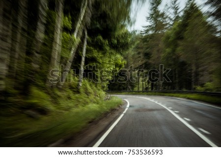 Driving fast through country roads dangerously could lead to fatal accidents. Left hand side driving united kingdom countryside