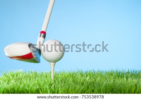 Hybrid Driver about the hit the Ball : Series of golfing equipment concept pictures.
Shot in studio on grass with blue background