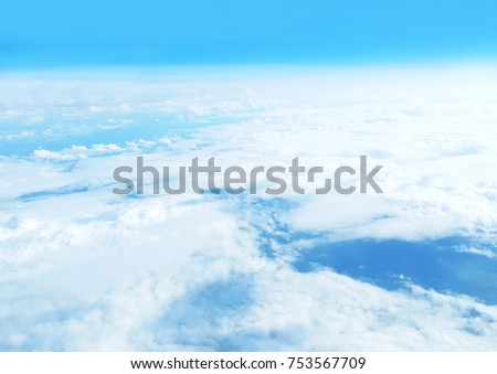 White clouds in blue sky background, aerial picture