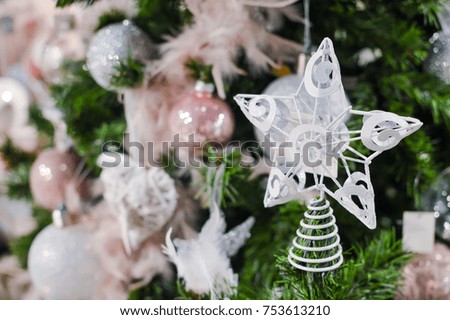 Decorated Christmas tree on joyful festive shiny blurred background, closeup image. Seasonal traditional bright joy, elegant natural classy mood, love and peace jolly design