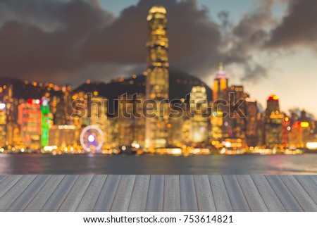 Opening wooden floor, Hong Kong night blurred bokeh light seafront, abstract background