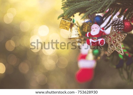 Decorated Christmas tree on blurred, sparkling and fairy  bokeh background