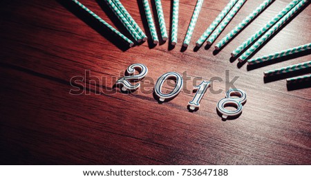 Happy New year 2018 Decorative Background images on the retro vintage style wooden texture table In the night's holidays for New year's and Merry Christmas .