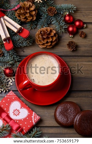 Closeup coffee in red cup and gift box. Christmas card