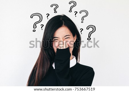 Young asian Student woman and question marks doodles at the back ground with copy space