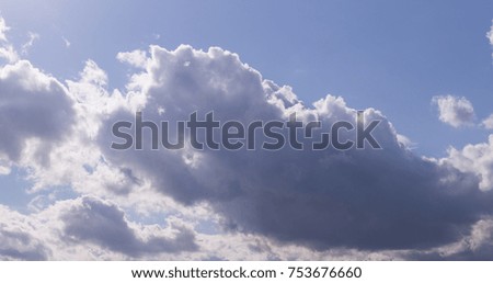 bright blue sky with clouds and sun. cumulus, background, weather.