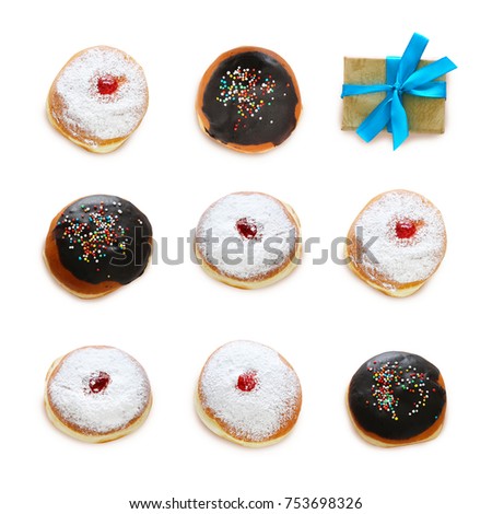 jewish holiday Hanukkah image with traditional doughnuts isolated on white