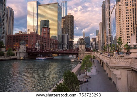 Chicago Skyline. Chicago downtown and Chicago River with bridges during sunset. 