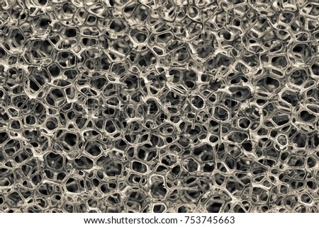 background and abstract twisted or tangled mesh texture of synthetic material closeup beige gray color