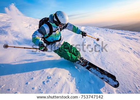 good skiing in the snowy mountains, Carpathians, Ukraine, nice winter day Royalty-Free Stock Photo #753747142