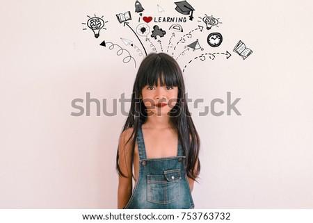 Young kid asian student girl  with learning doodles - I love learning concept