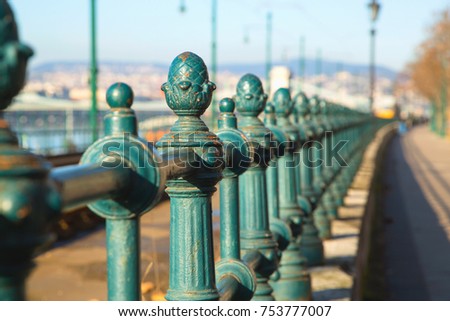 Attractions of Budapest. Green fence tram tracks along the Danube River, Budapest.
