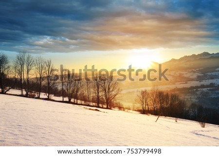 Beautiful and colorful view of the rising sun in winter