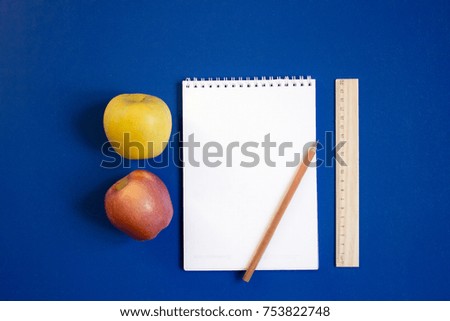 To do list empty blank mock up on blue background. Pencil, ruler, apple and notebook