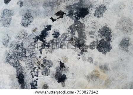 Cement floor with engine oil splash for texture background