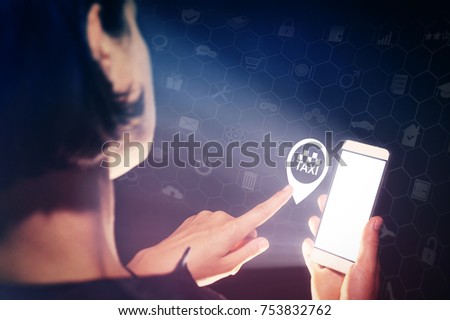 Image of a girl with a smartphone in hands. She presses on the taxi icon. Services for finding and ordering a taxi.