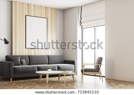 Living room interior with white and wooden walls, a wooden floor, a gray sofa and a framed vertical poster hanging above it. A side view. 3d rendering mock up