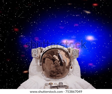 Astronaut posing. The elements of this image furnished by NASA.
