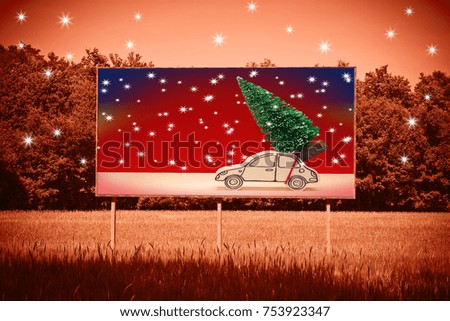 Christmas holiday concept with a pine tree on handmade cartoon toy car on advertising billboard