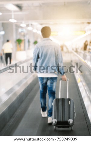 walking passenger in airport blur motion