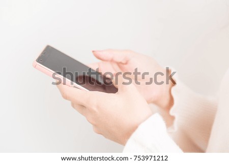 japanese woman holding smartphone