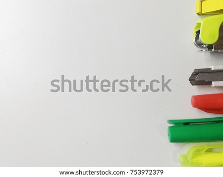Directly Above Shot Of Book, Pencil, Pen, Scissor and Ruler With Eyeglasses Over White Background Royalty-Free Stock Photo #753972379