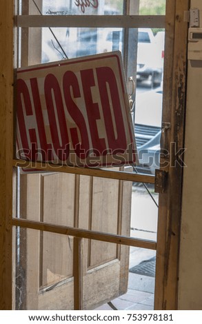 "Closed" sign on shop door