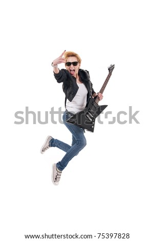 rockstar screaming and jumping with electric guitar making rock sign over white