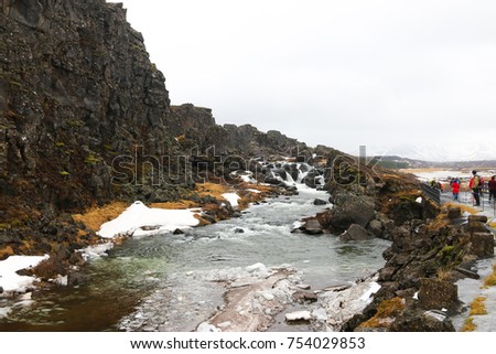 A mini waterfall near Thingvellir National park, Iceland. Soft focus and motion blur due to long exposure shot
