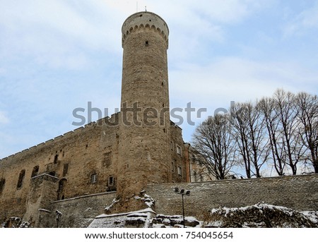 Old fort in winter. Awesome photo of an ancient fortification. Wonderful image of a tower, wall of a medieval fortress. Travel &Vacation. Sightseeing in Europe. Historical heritage of Baltic countries