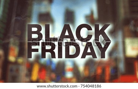 Black friday poster. Blurry cityscape background
