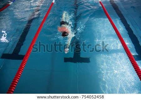 Swimmer in swimming pool - professional sport photo