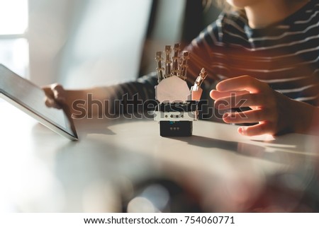 Researching about Robotic Arm Royalty-Free Stock Photo #754060771