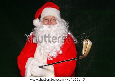 Santa Claus. Santa Claus holds his Golden Golf Club.