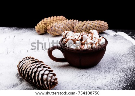 Christmas Food Sweet Marshmallow with Chocolate in Brown Cup on Black Background. 