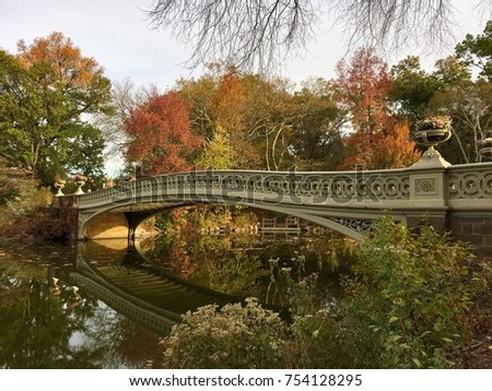 Bow bridge over lake at Central Park in morning autumn