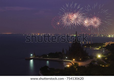 Sanctuary truth temple with fireworks in Pattaya, Thailand. Fireworks new year festival.