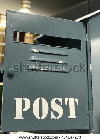 Post box with white text post