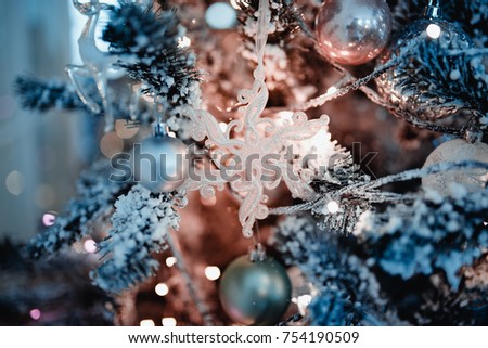 Close up Decorated Christmas tree on blurred, bokeh background