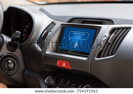 multimedia system with app personal assistant on screen in car  Royalty-Free Stock Photo #754191961