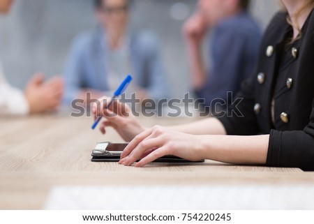 young businesswoman hand using pen closeup shot