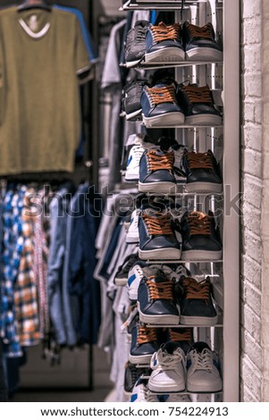 Stylish fashion in a store with shoes in focus. No brand names or copyright objects