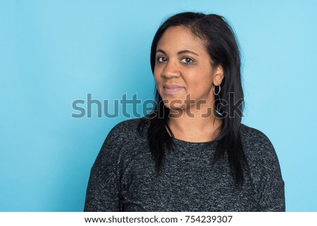 Portrait of a mother on a blue background